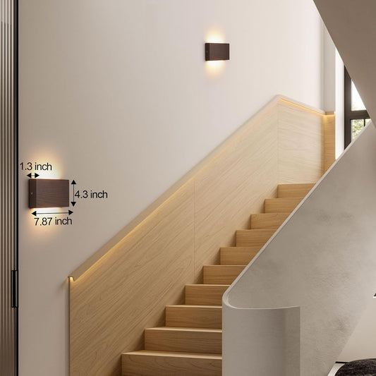Modern staircase with wall-mounted lights and measurements indicated.