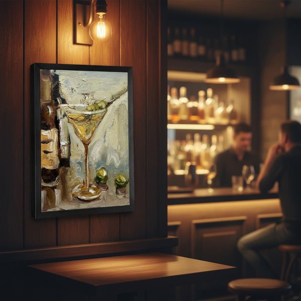 Framed painting of a cocktail on a bar wall with a blurred bar scene in the background.
