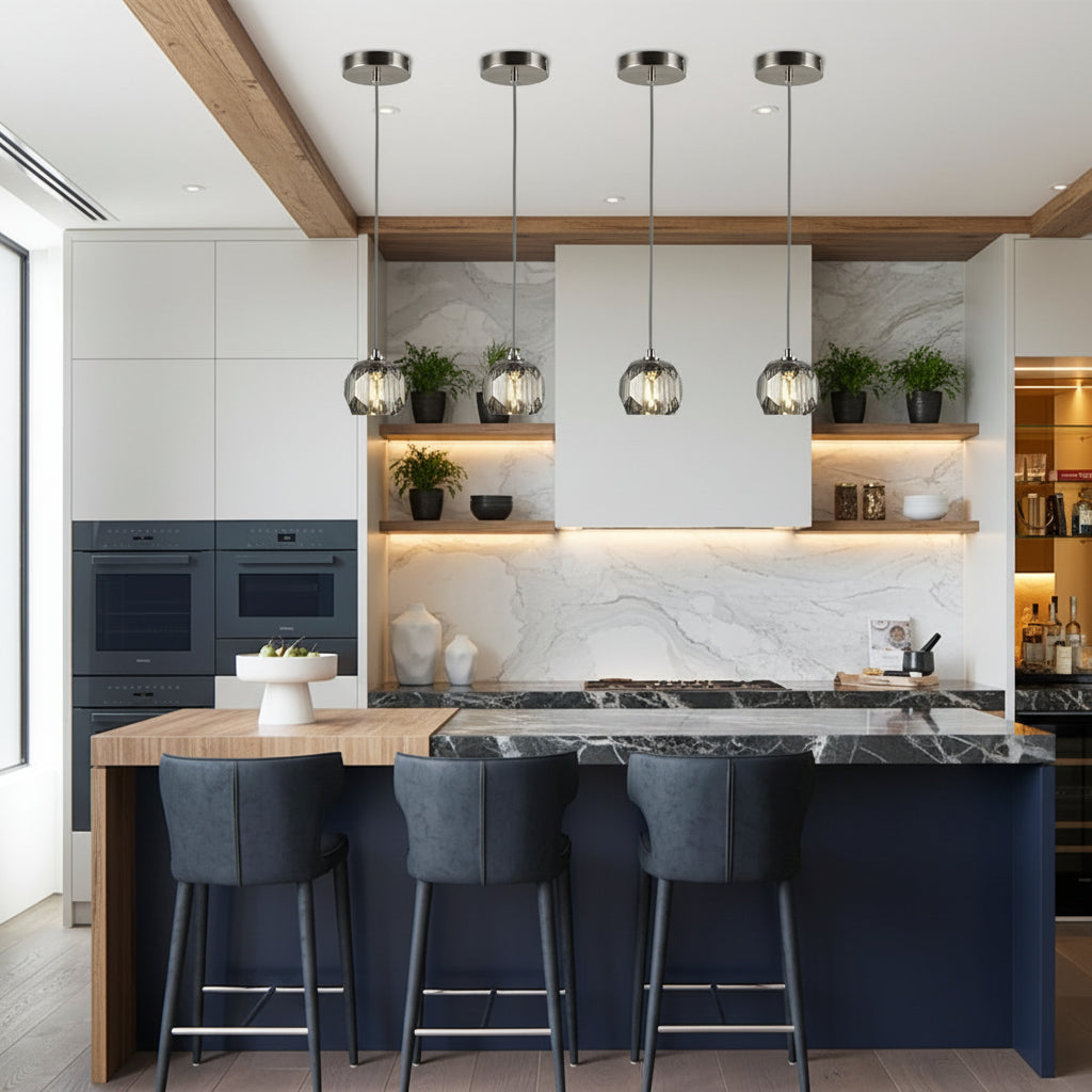 Modern kitchen with marble island, pendant lights, and bar stools.