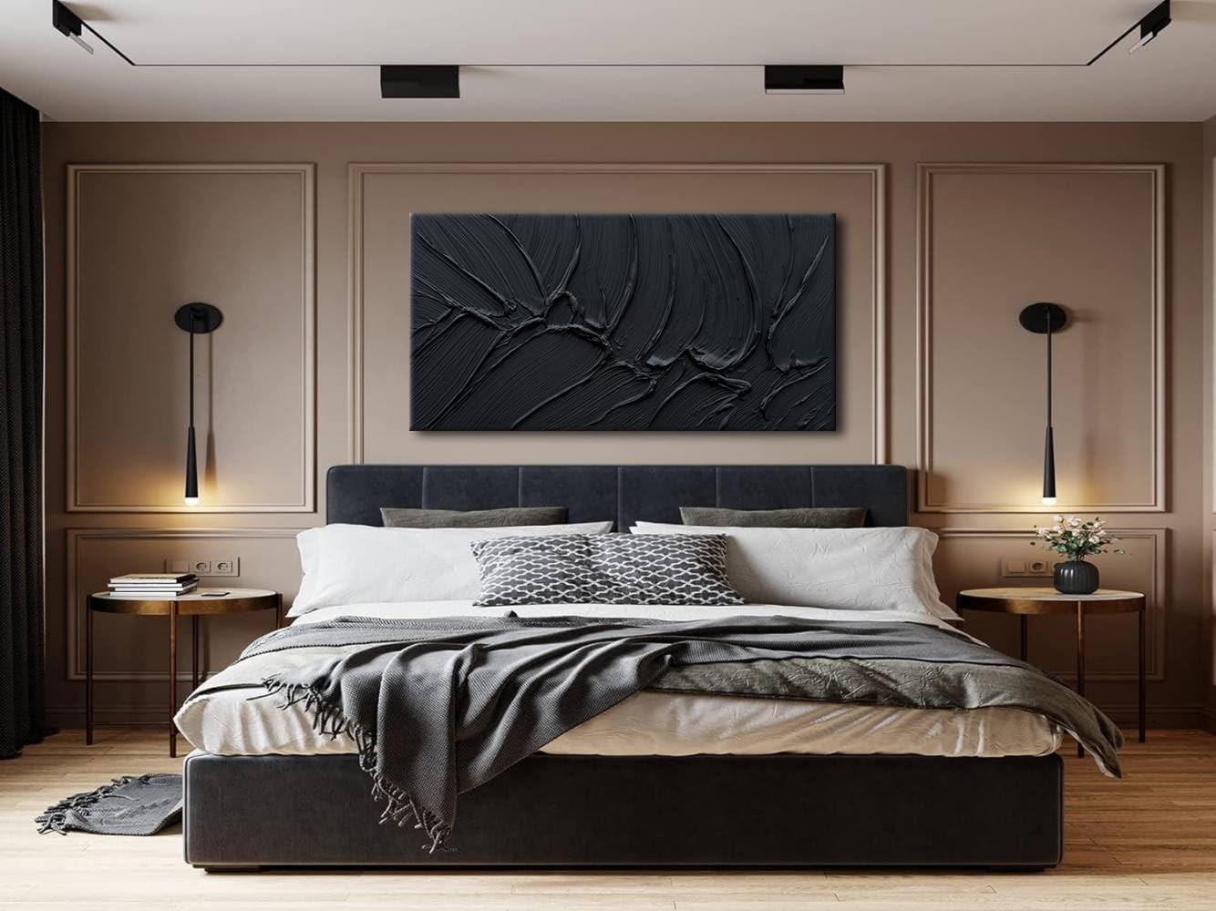 Modern bedroom with a bed, nightstands, and wall art.