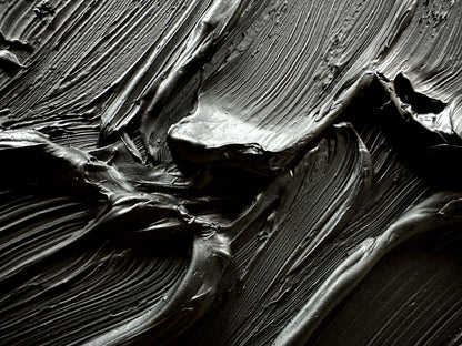 Close-up of black and white textured paint strokes