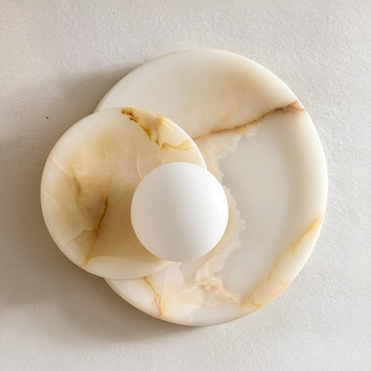 Marble-patterned ring holder on a light gray background