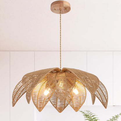 Woven pendant light fixture with leaf-like design on a white wall background