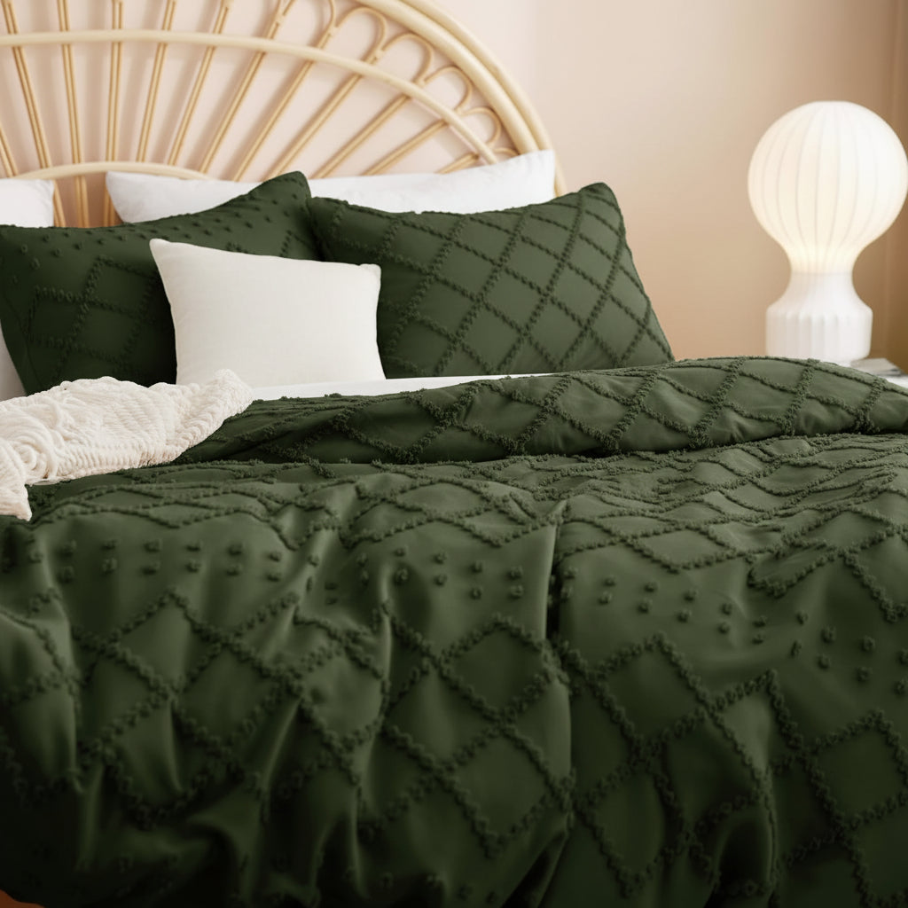 Woman reading a book on a bed with green bedding