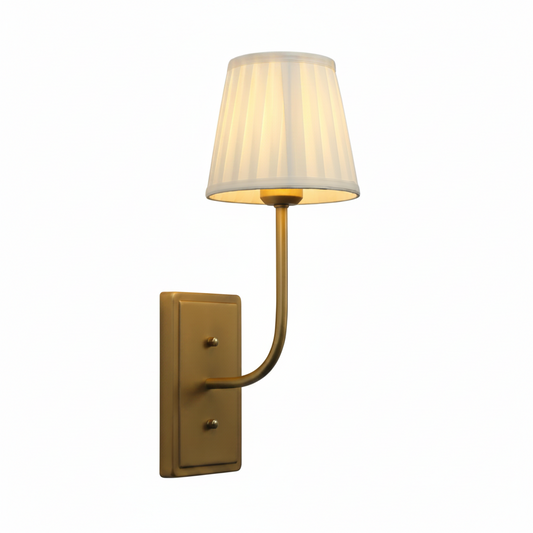 Wall-mounted lamp with a white shade and gold fixture on a white background