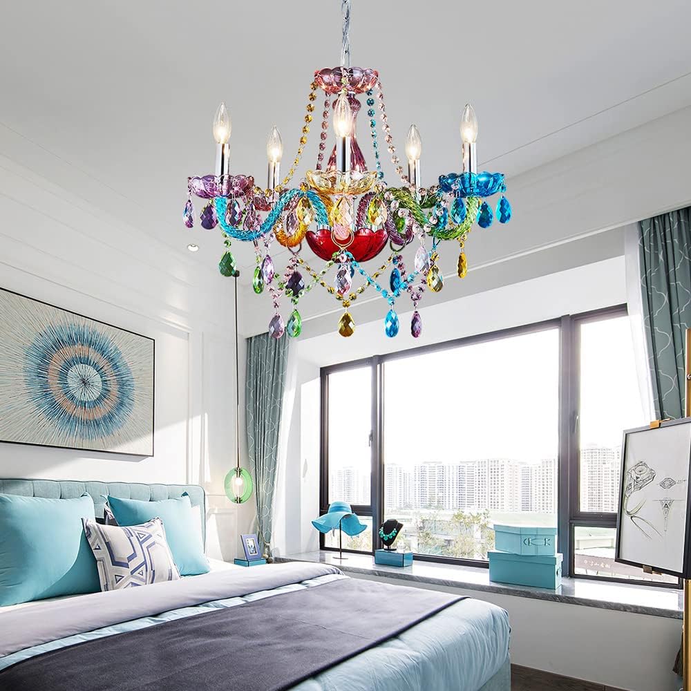 Colorful chandelier in a modern bedroom with large windows and decorative elements.