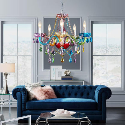 Colorful chandelier hanging above a blue sofa in a living room.