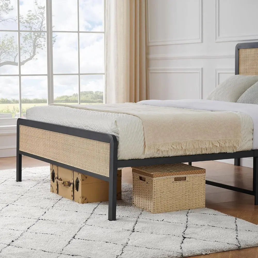 Bedroom with a bed featuring a beige blanket and wicker nightstands.