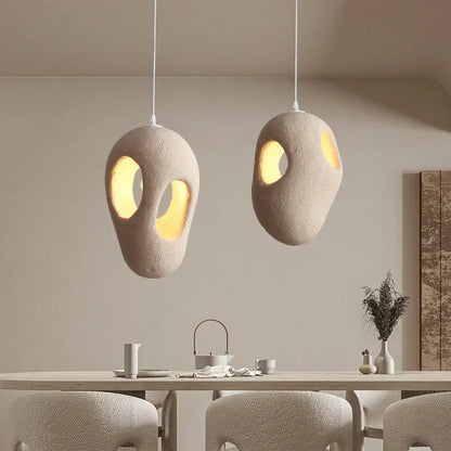Aurora Glow Pendant Lamp: Chic round hanging lamp for contemporary interiors.