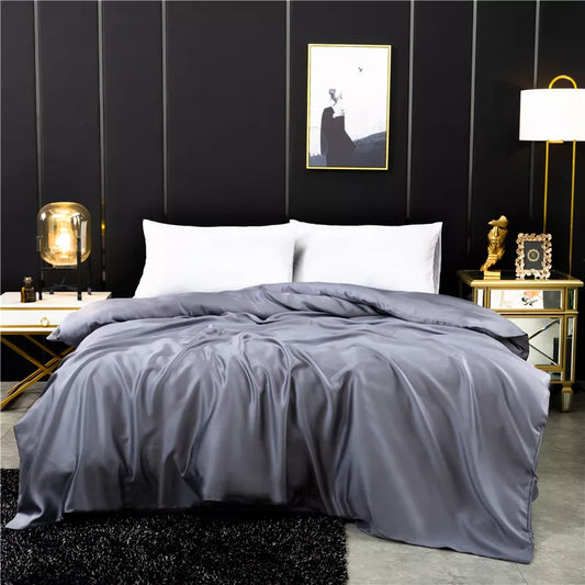 Midnight Serenity Silk Duvet Cover: Luxurious black silk duvet cover, perfect for a peaceful night's sleep.