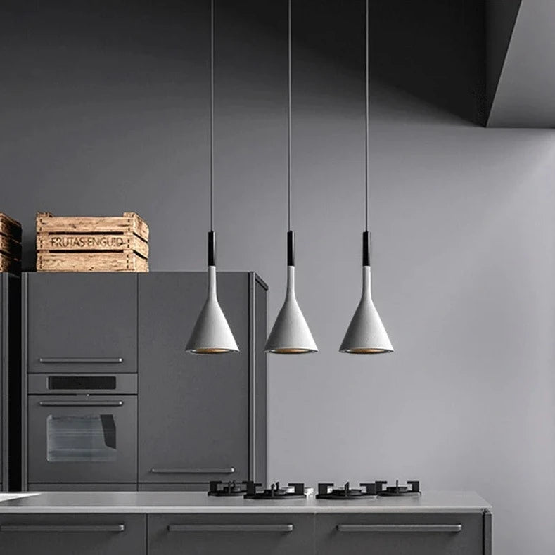 Contemporary PureBeam Pendant Light lamps dangling from the ceiling.