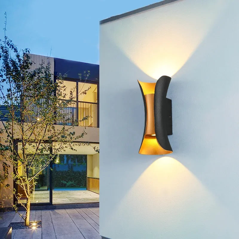 A sleek modern wall light on a white wall, featuring the Nordic Glow Waterproof Sconce Lamp.