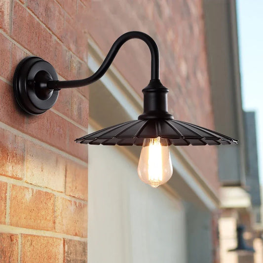 Americana Loft Wall Lantern: Vintage-style black outdoor wall light with classic bulb.