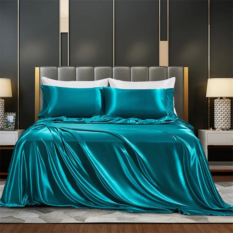 LuxeSatin Summer Bed Sheet Set in blue satin draped elegantly over a bed.