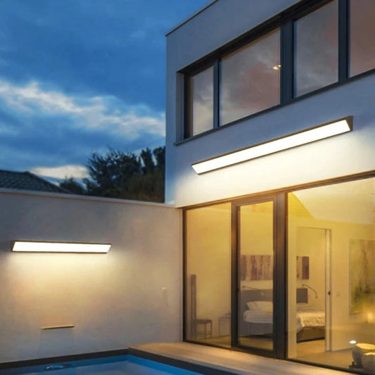 Outdoor LED wall light with IllumiGuard technology for enhanced brightness and energy efficiency.