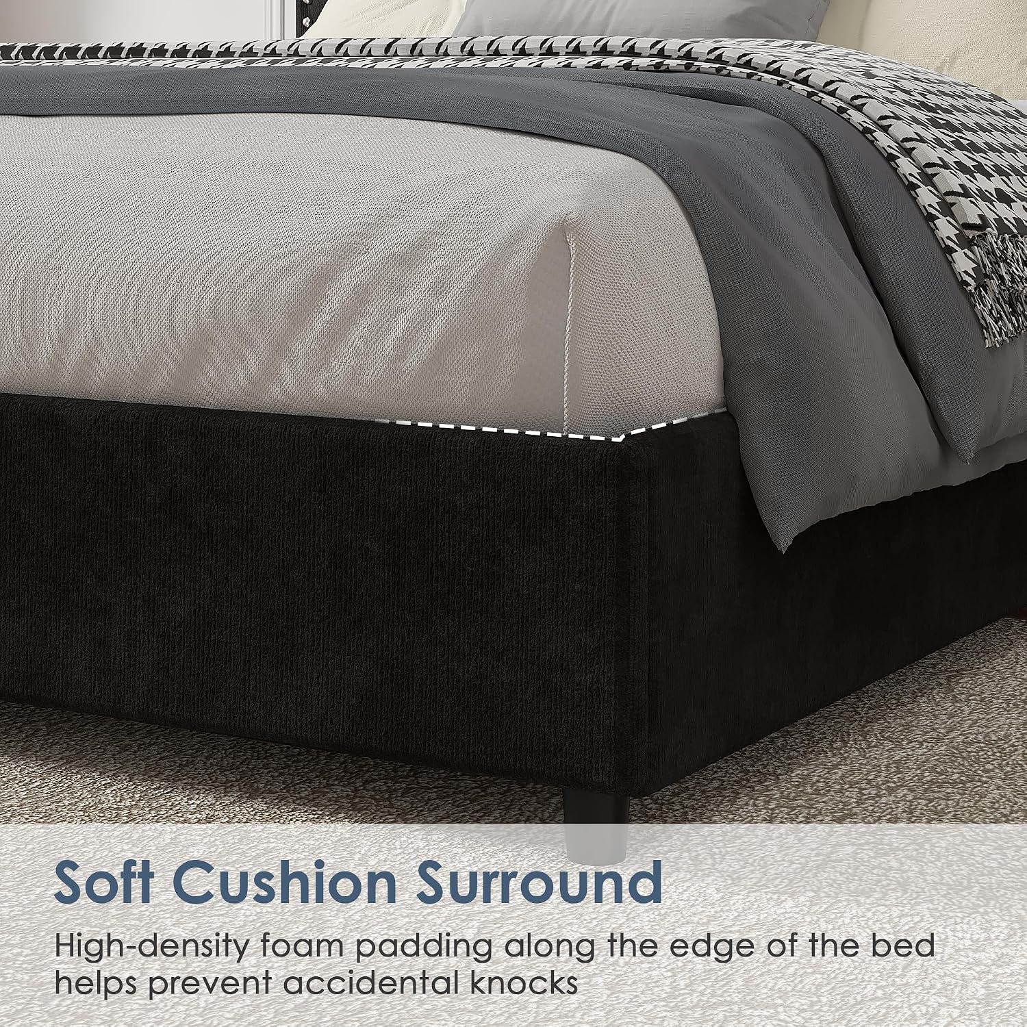 Close-up of a bed with a dark upholstered base and light gray bedding, with text at the bottom reading 'Soft Cushion Surround' and a descriptive feature callout.