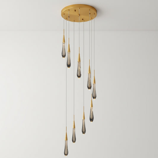 Modern chandelier with hanging glass shades on a black background