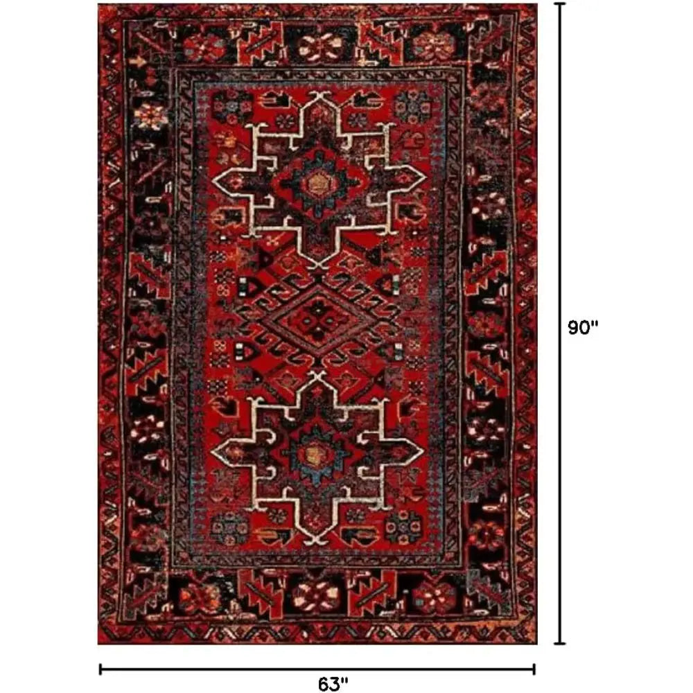 Angle view of red Persian rug with rich wool texture and knotted fringe in natural light