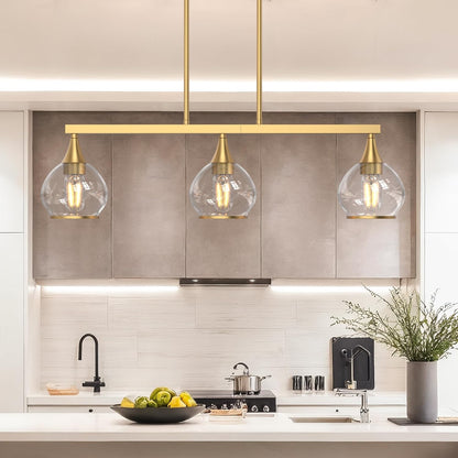 Modern kitchen with pendant lights, countertop items, and a neutral color scheme.