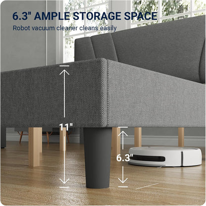 A gray upholstered sofa in a real room with wood flooring and a white robotic vacuum underneath, overlaid with measurement arrows and text reading 6.3" ample storage space, 11" height, and 6.
