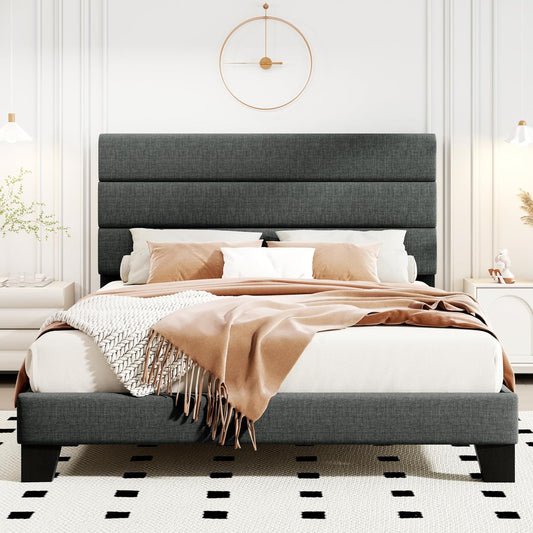 Gray upholstered bed with white bedding and a beige throw blanket in a bedroom setting.