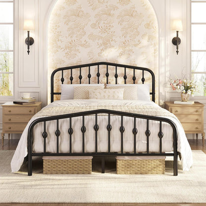 A black metal bed frame with a decorative spindle headboard and footboard, styled with white bedding in a bright, classic bedroom setting.