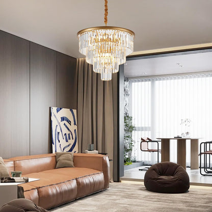 Modern living room with a chandelier, brown sofa, and bean bag chair.