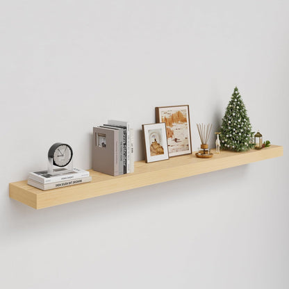 Wooden shelf with decorative items on a plain wall