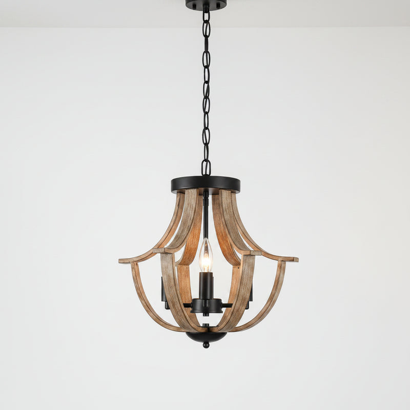 Wooden chandelier with black accents hanging against a neutral wall.