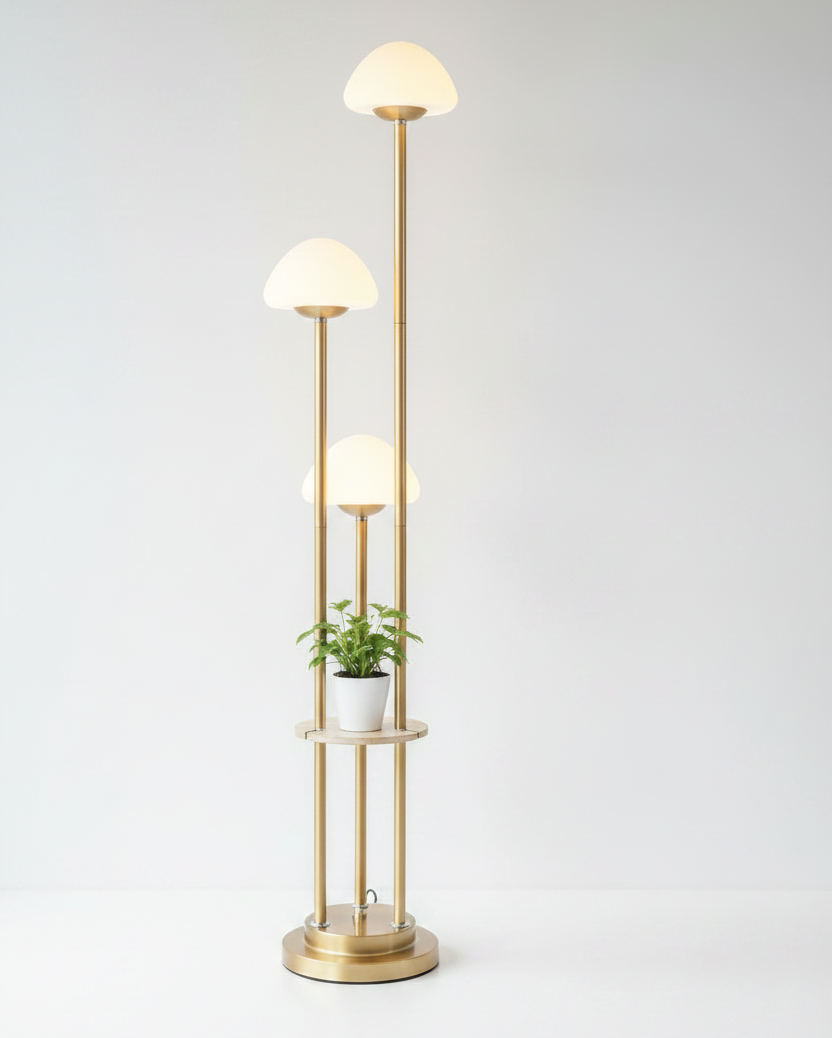 Modern floor lamp with glass shades and a plant on a white background