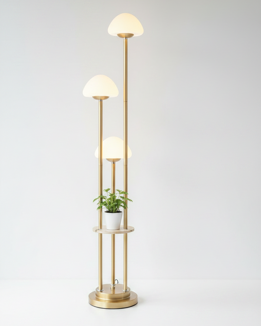 Modern floor lamp with glass shades and a plant on a white background