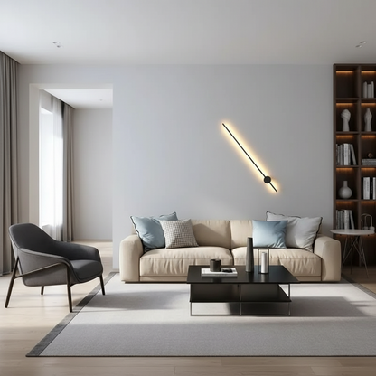 A modern living room featuring a beige fabric sofa with blue and gray accent pillows, a black coffee table, a gray armchair, and a minimalist wall-mounted linear light on a light gray wall.