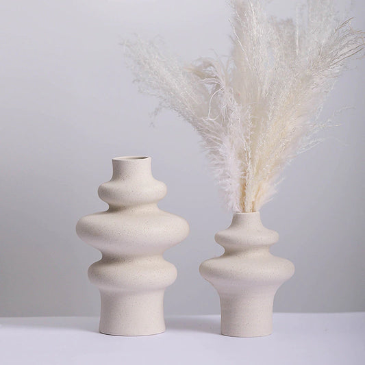 Bring a touch of elegance to your living space with this Ceramic Handmade Vase. Made from high-quality ceramic and porcelain materials, a unique touch.