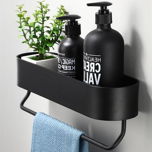 black bathroom shelf with towel bar