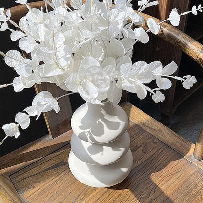 white flower vase