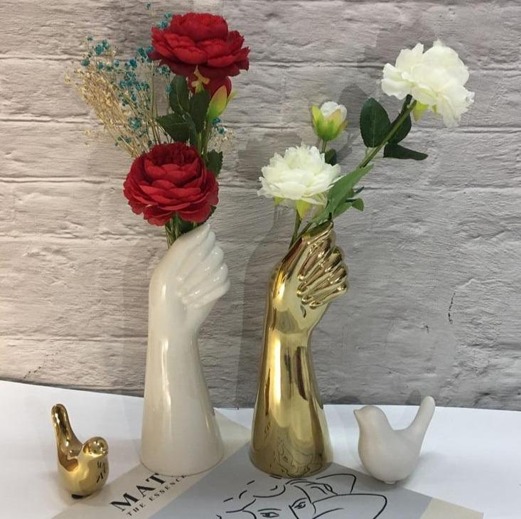 gold and white vases