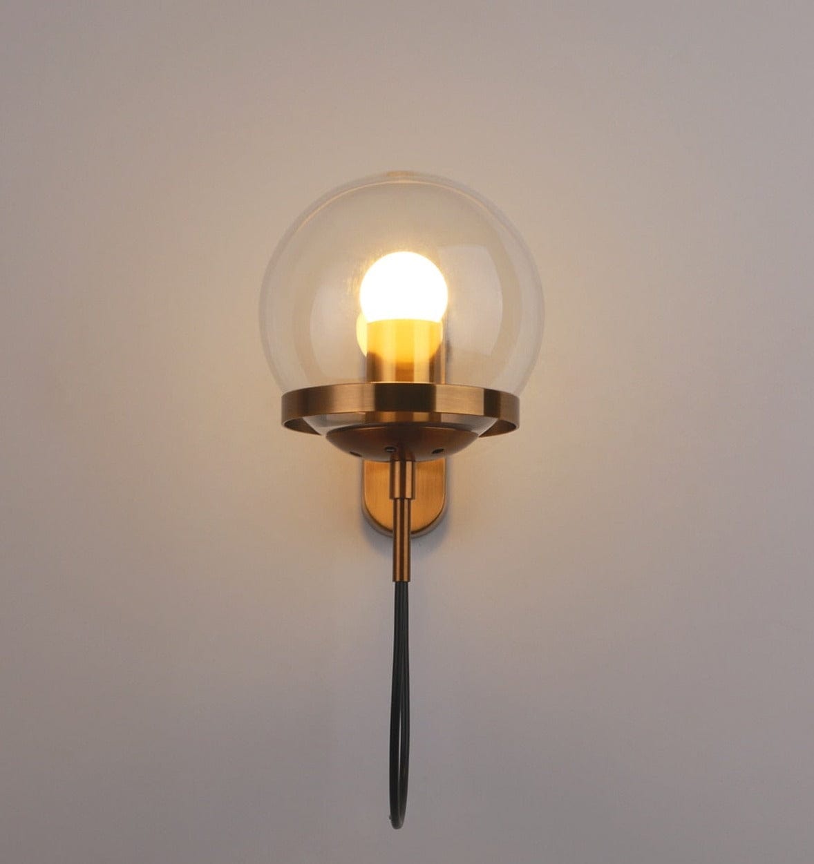Gold glass globe wall sconce