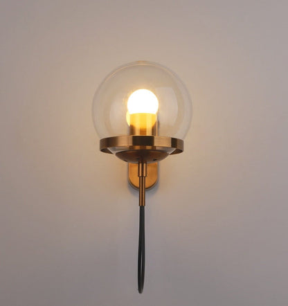 Gold glass globe wall sconce